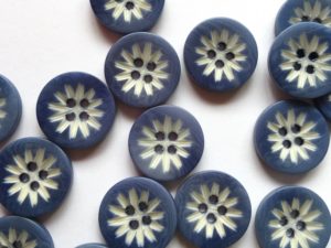 corozo buttons - lasered flower design