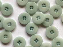 Corozo buttons - flat rim.