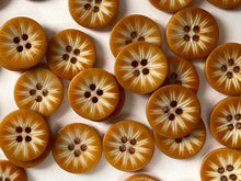 corozo buttons - lasered flower design